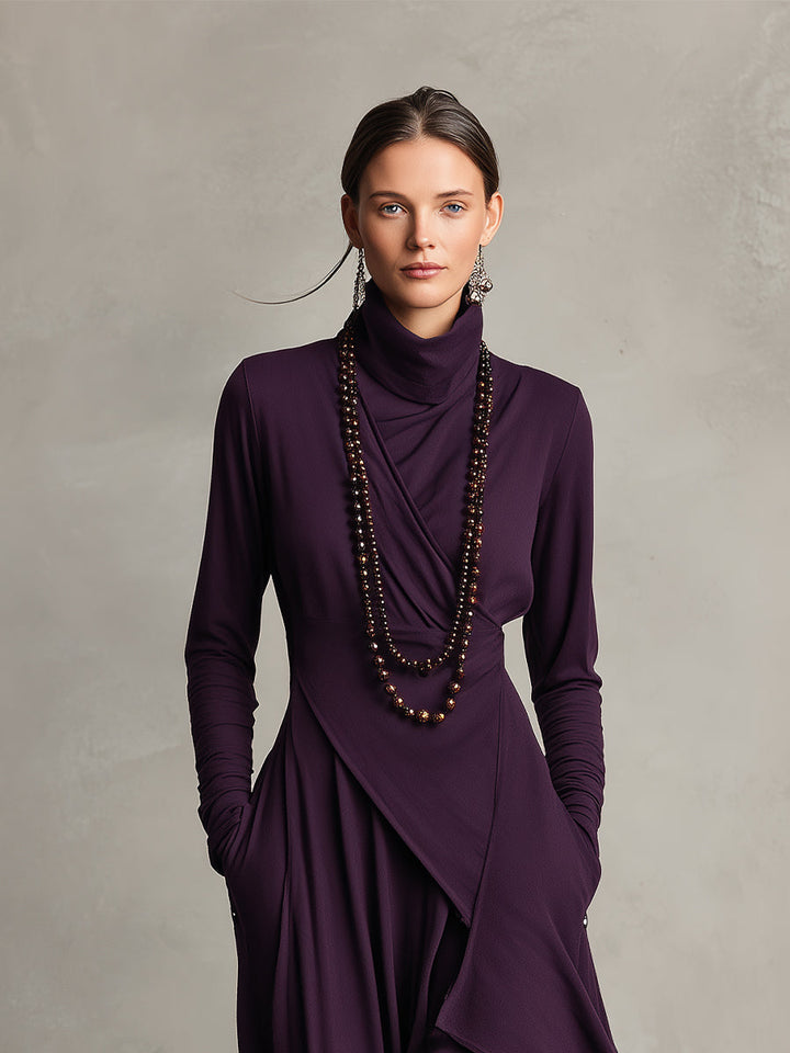 Carrie – Robe maxi en tricot asymétrique avec col roulé
