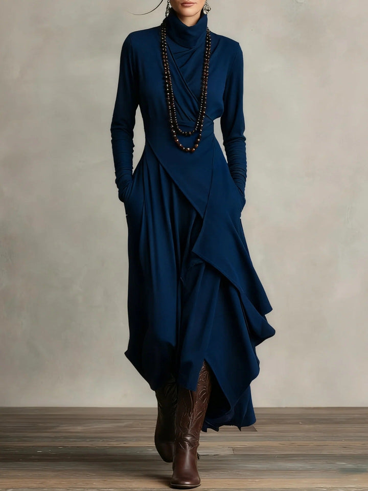 Carrie – Robe maxi en tricot asymétrique avec col roulé